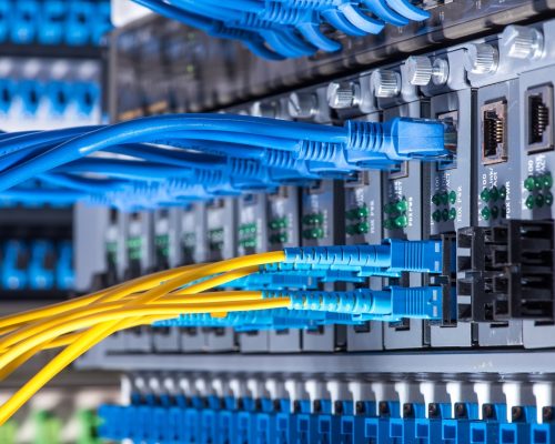 Fiber Optic cables and UTP Network cables Fiber Optic cables and UTP Network cables connected hub ports.